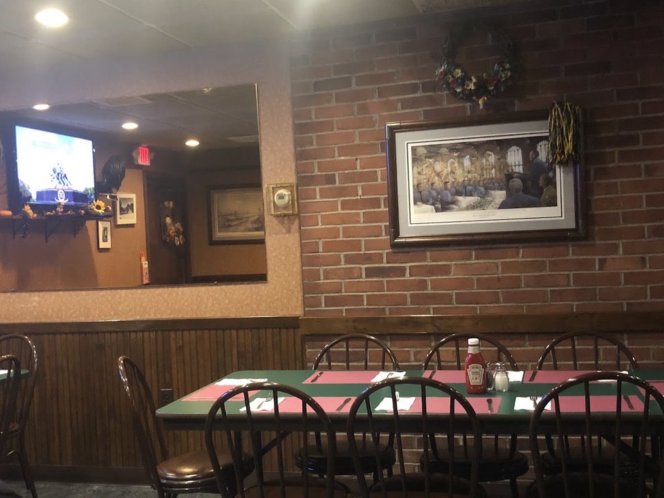 American restaurant interior with booth seating.